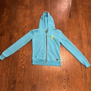 Turquoise lighting bolt Aviator Nation zip up hoodie